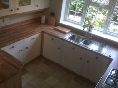 A solid oak hand painted shaker style kitchen